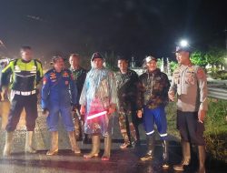 Polres Parigi Moutong Sigap Amankan Lokasi Banjir di Dusun Penebel, Torue
